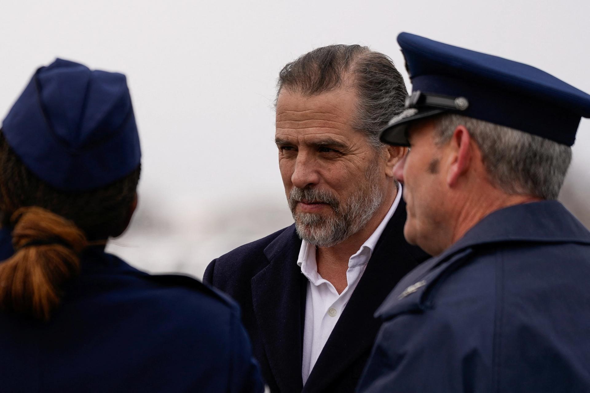 Hunter Biden arrives at at Hancock Field Air National Guard Base after disembarking from Air Force One with his father.