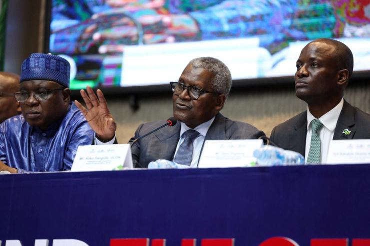 Group Chairman of Nigerian Exchange Group, Umaru Kwairanga, President of Dangote Group, Aliko Dangote and Managing Director of Nigerian Exchange Group, Temi Popoola in Lagos, Nigeria, Sept. 14, 2026
