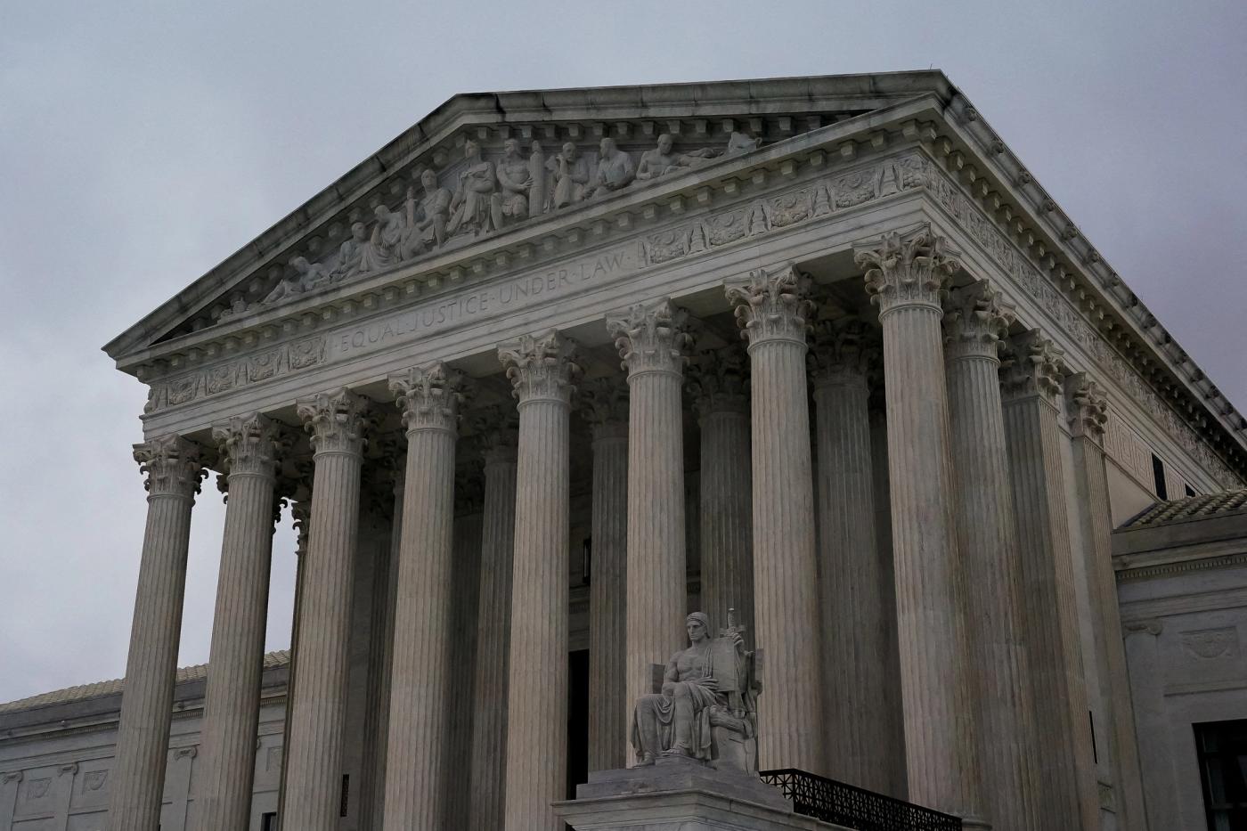 The U.S. Supreme Court building is seen in the rain in Washington, U.S., October 2, 2022. REUTERS/Elizabeth Frantz/File Photo