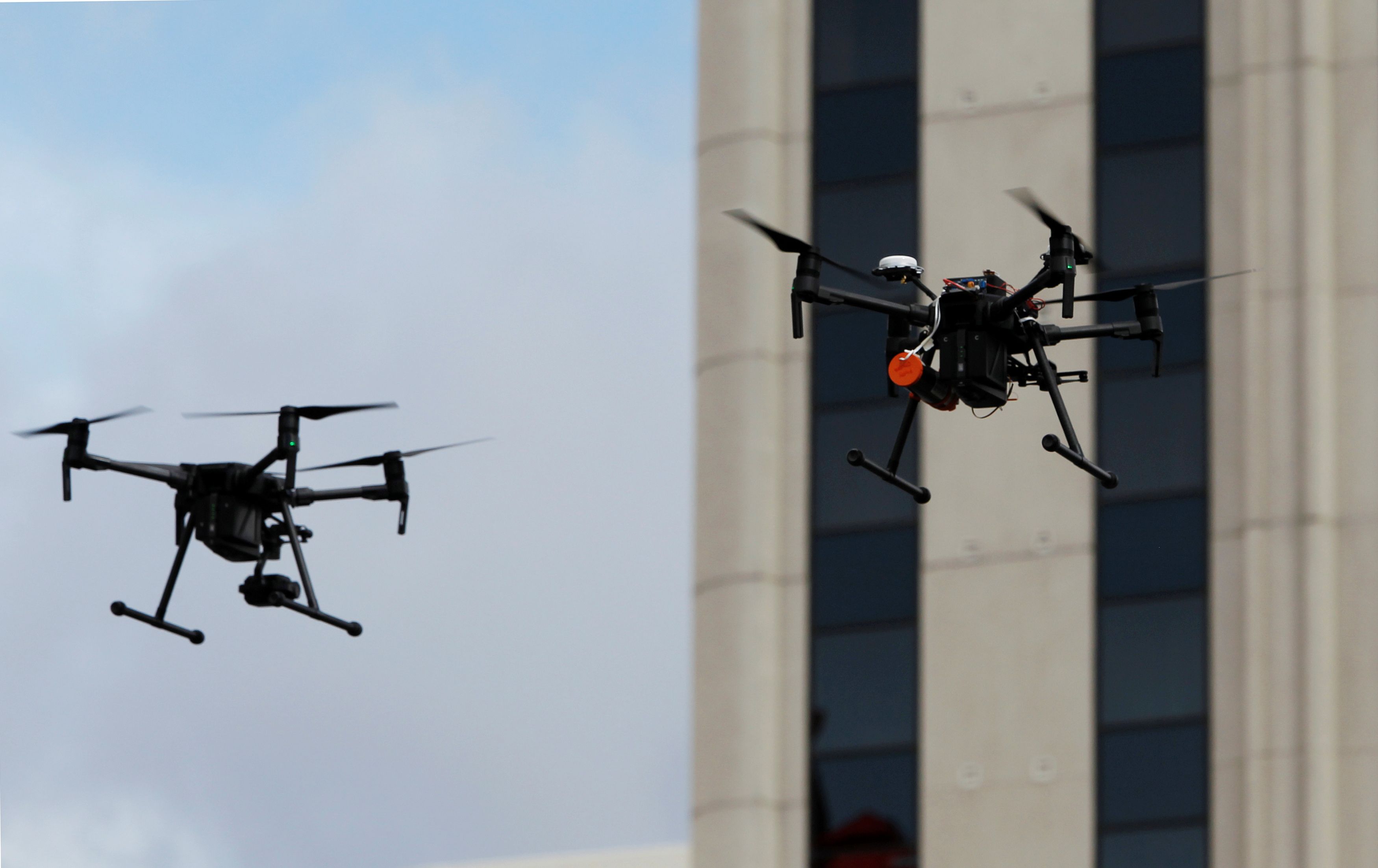 Drones near a building