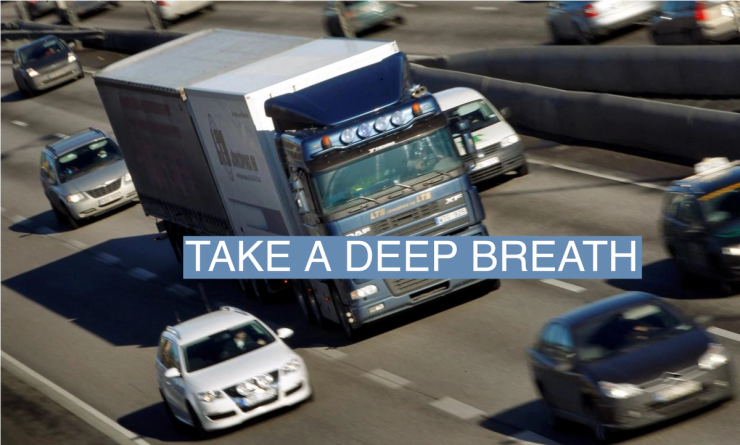 A diesel truck drives on the motorway through central Stockholm in this picture taken March 11, 2011. REUTERS/Bob Strong/File Photo
