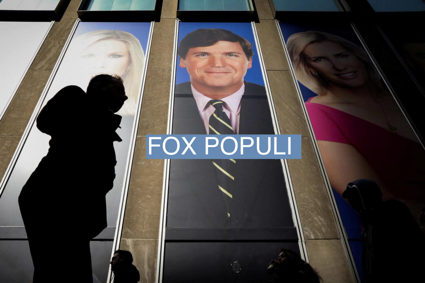 A promo of Fox News host Tucker Carlson on the News Corporation building in New York in 2019.