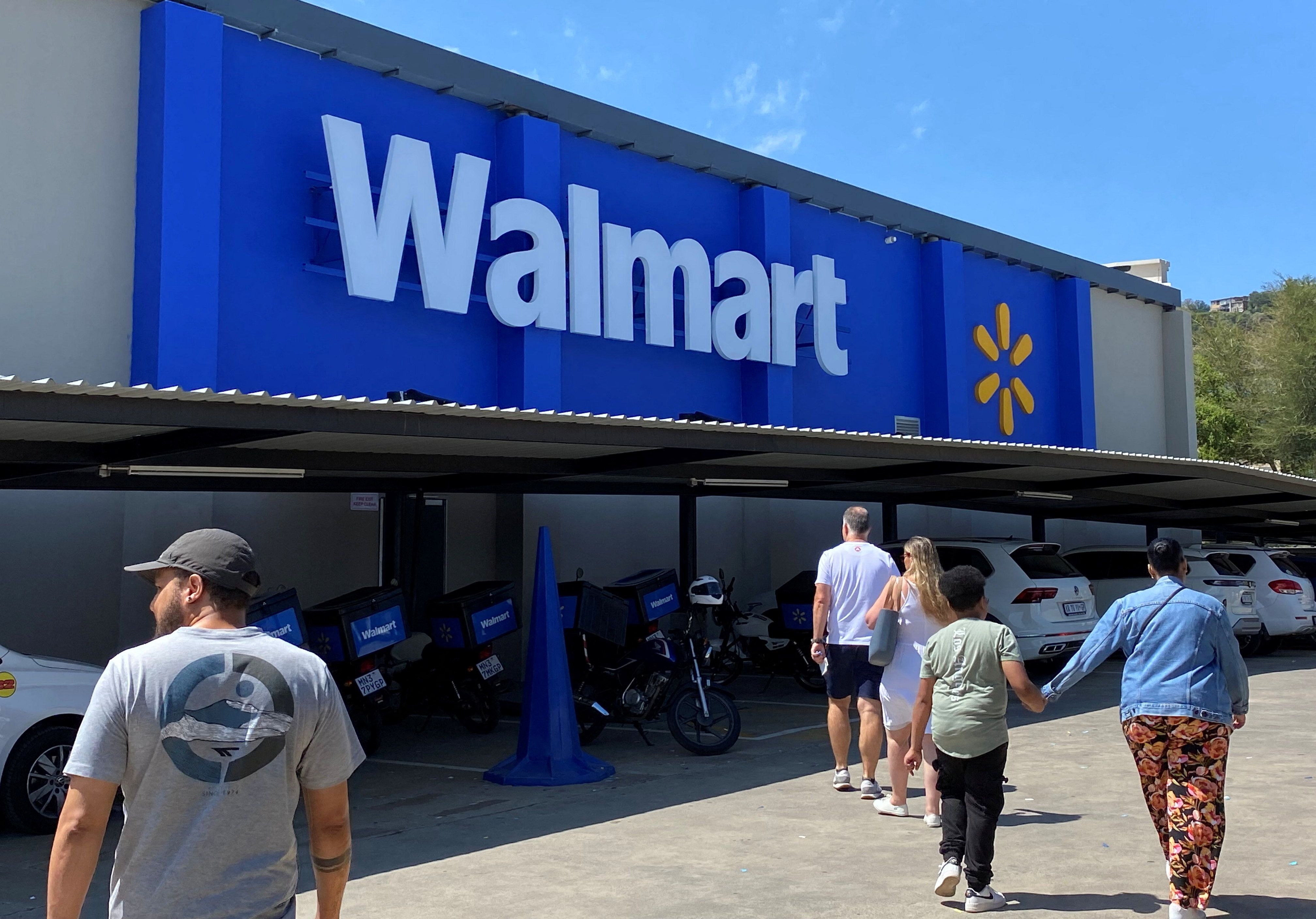 Shoppers enter a Walmart store