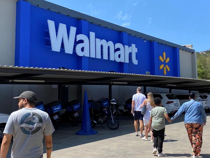 Shoppers enter a Walmart store