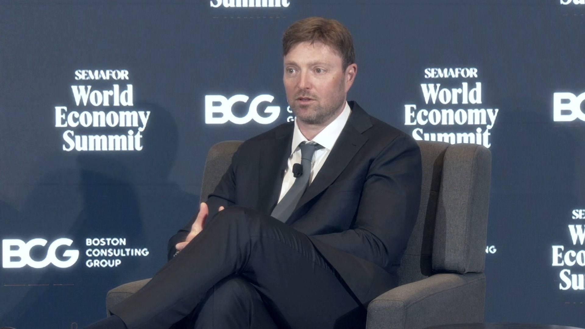 Alex Chriss on stage. 