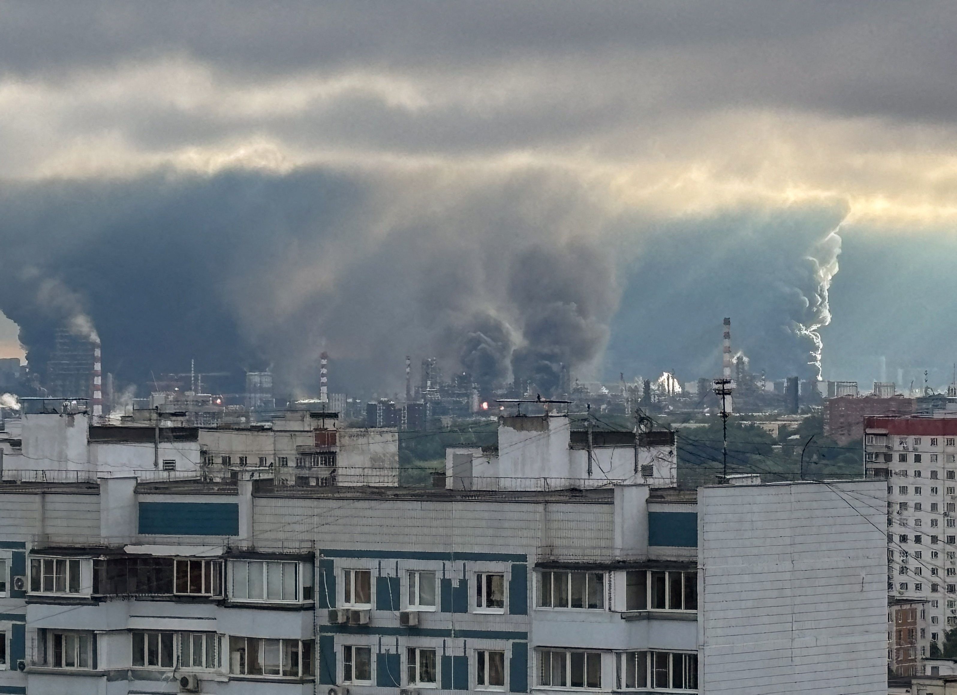 Plumes of smoke rise from a Moscow oil refinery following what the authorities say is a Ukrainian drone strike. 