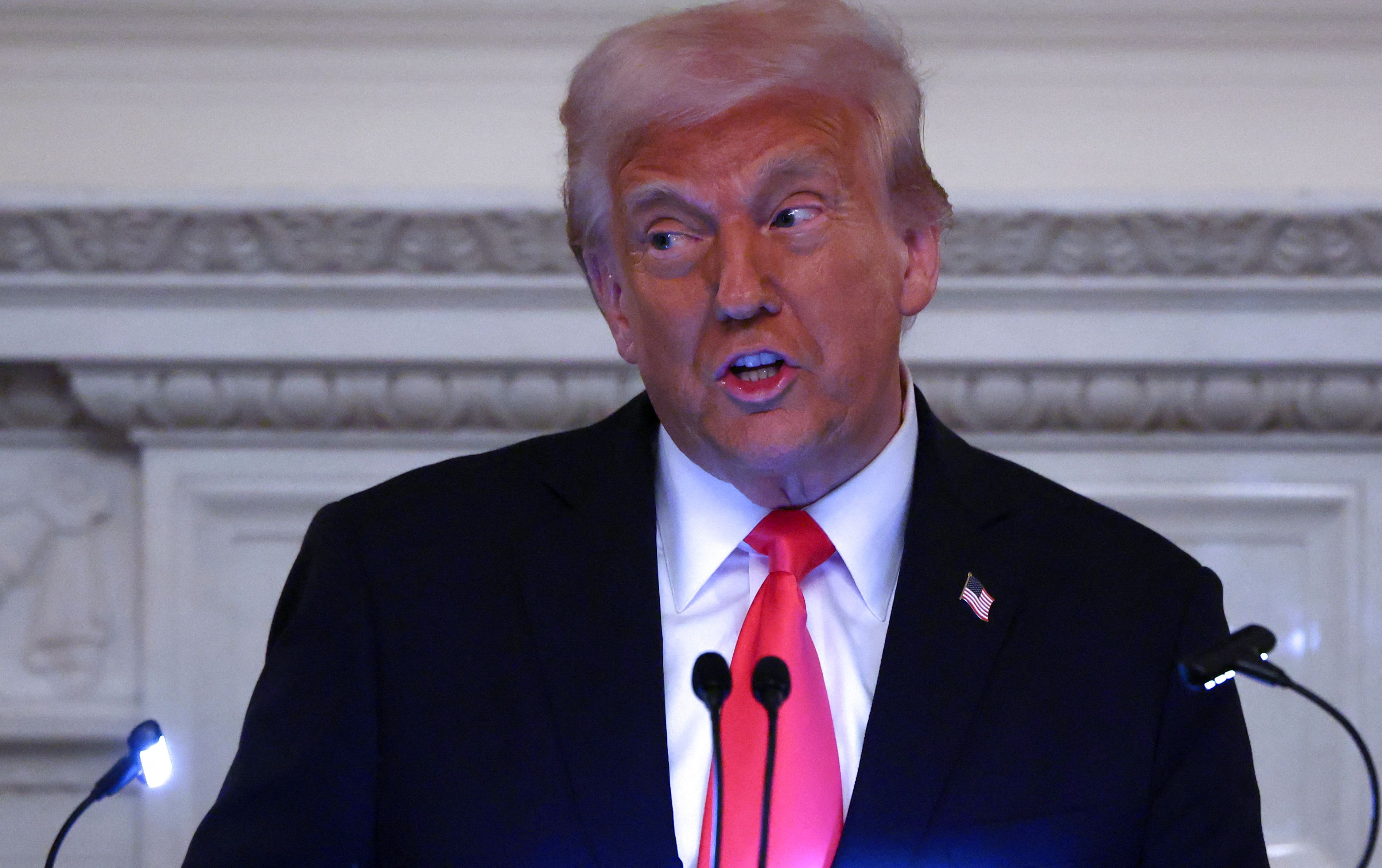 President Donald Trump speaks as he participates in the White House Iftar dinner at the State Dining Room of the White House in Washington, in March 2025.