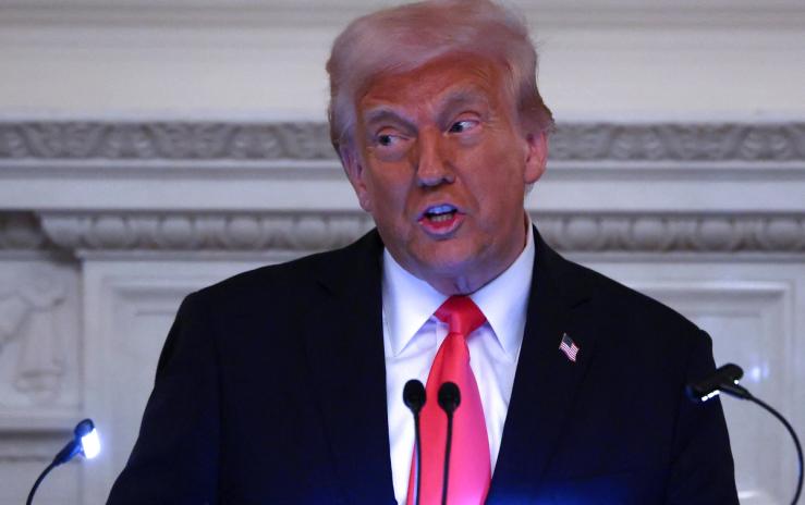 President Donald Trump speaks as he participates in the White House Iftar dinner at the State Dining Room of the White House in Washington, in March 2025.