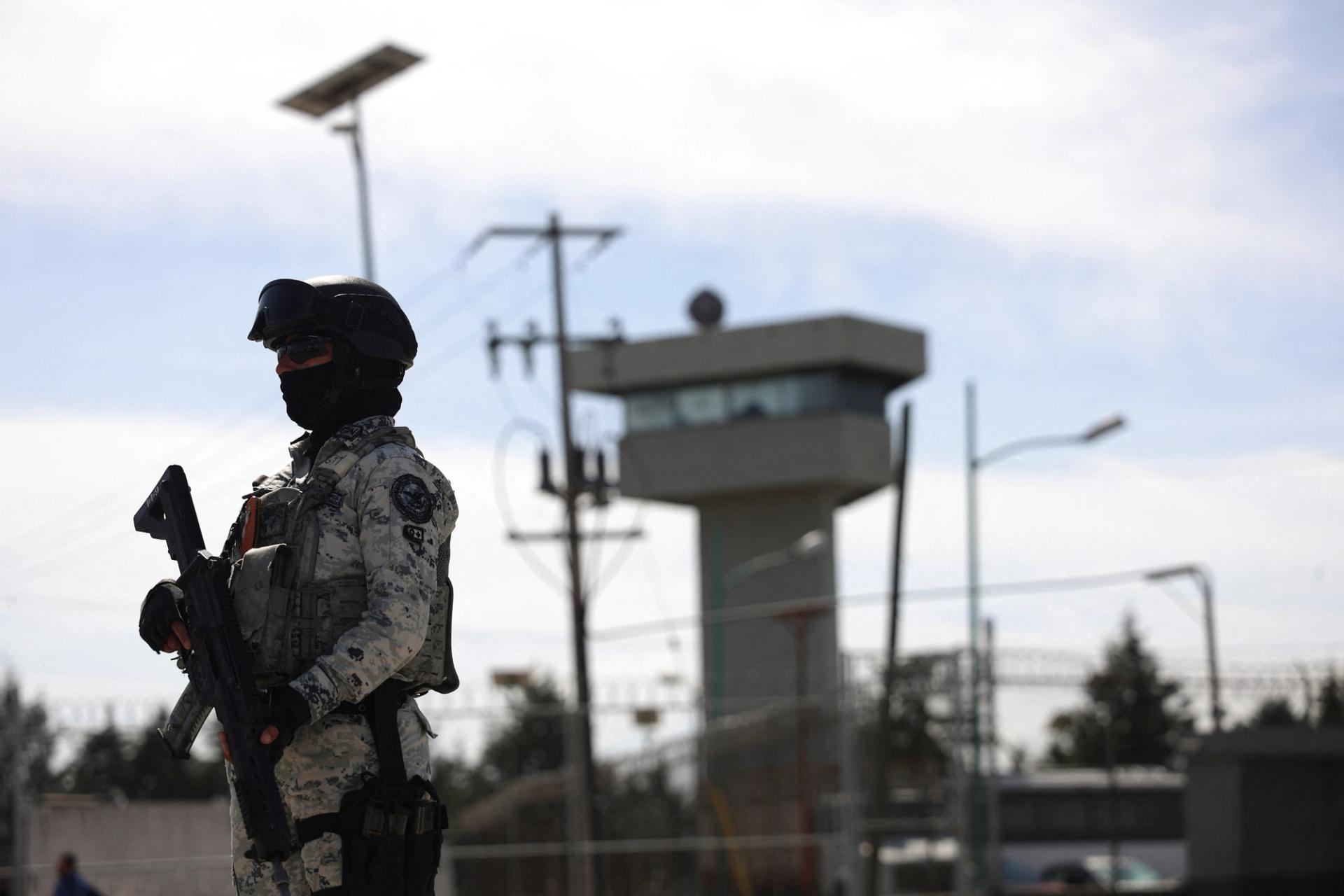 A member of the Mexican National Guard keeps watch outside the Altipano high security prison where ex-Gulf Cartel chief Osiel Cardenas is imprisoned