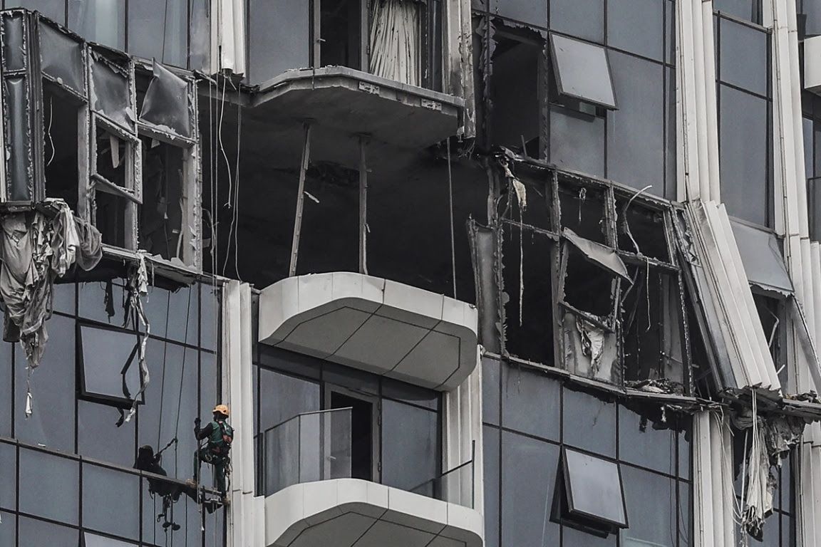 Damage to a building from an Iranian projectile in Dubai. 