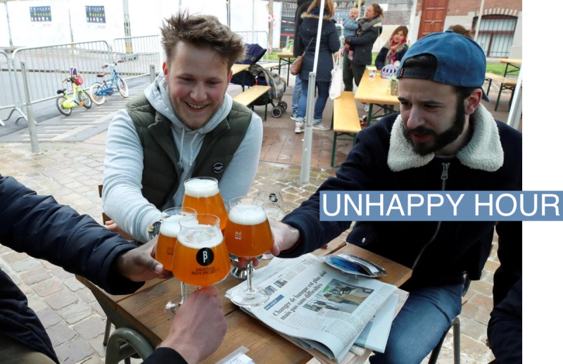 Customers enjoy a beer on the terrace at La Fourmiliere bar in Belgium.