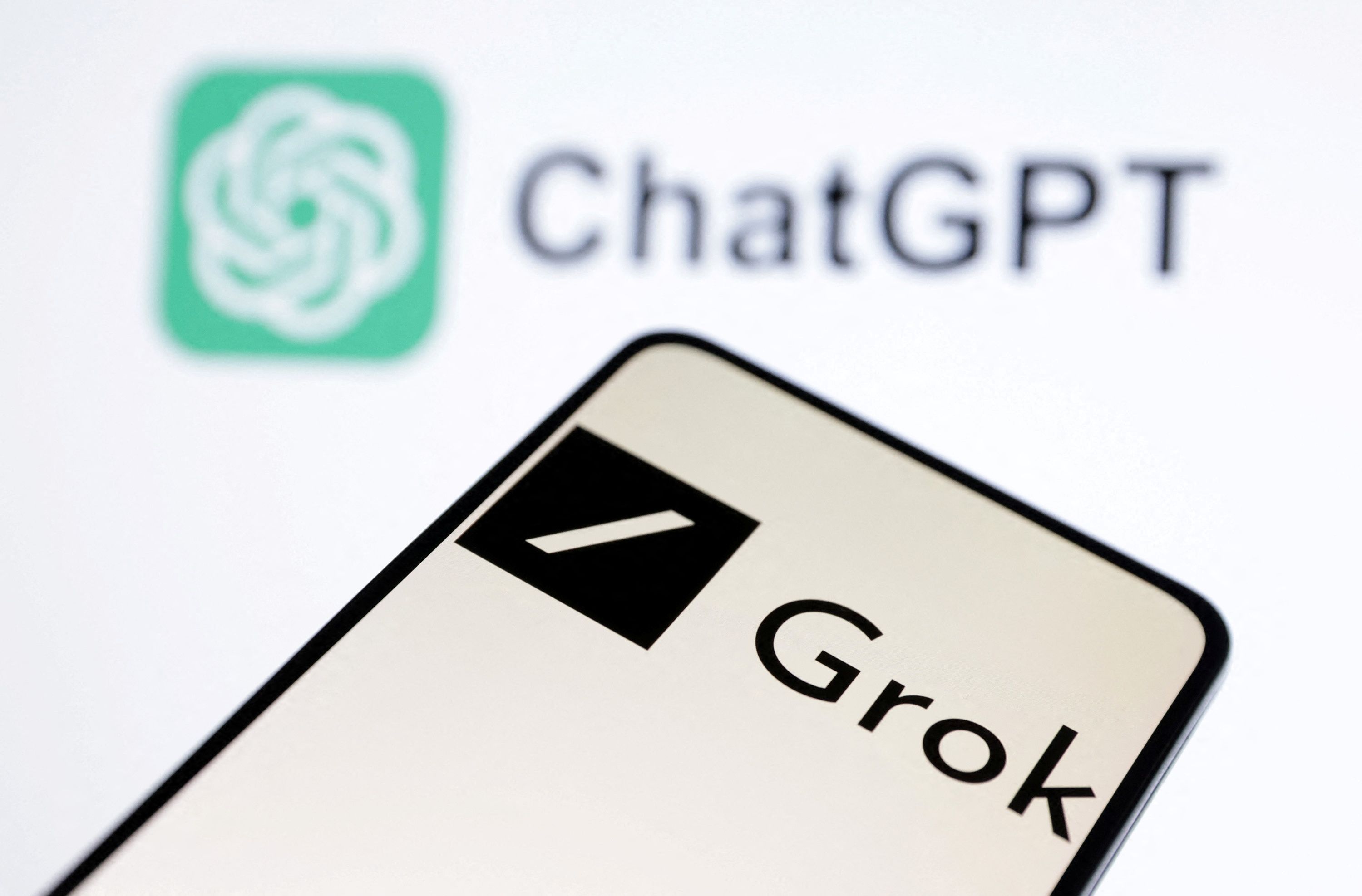 xAI Grok chatbot and ChatGPT logos are seen in this illustration taken, March 11, 2024.