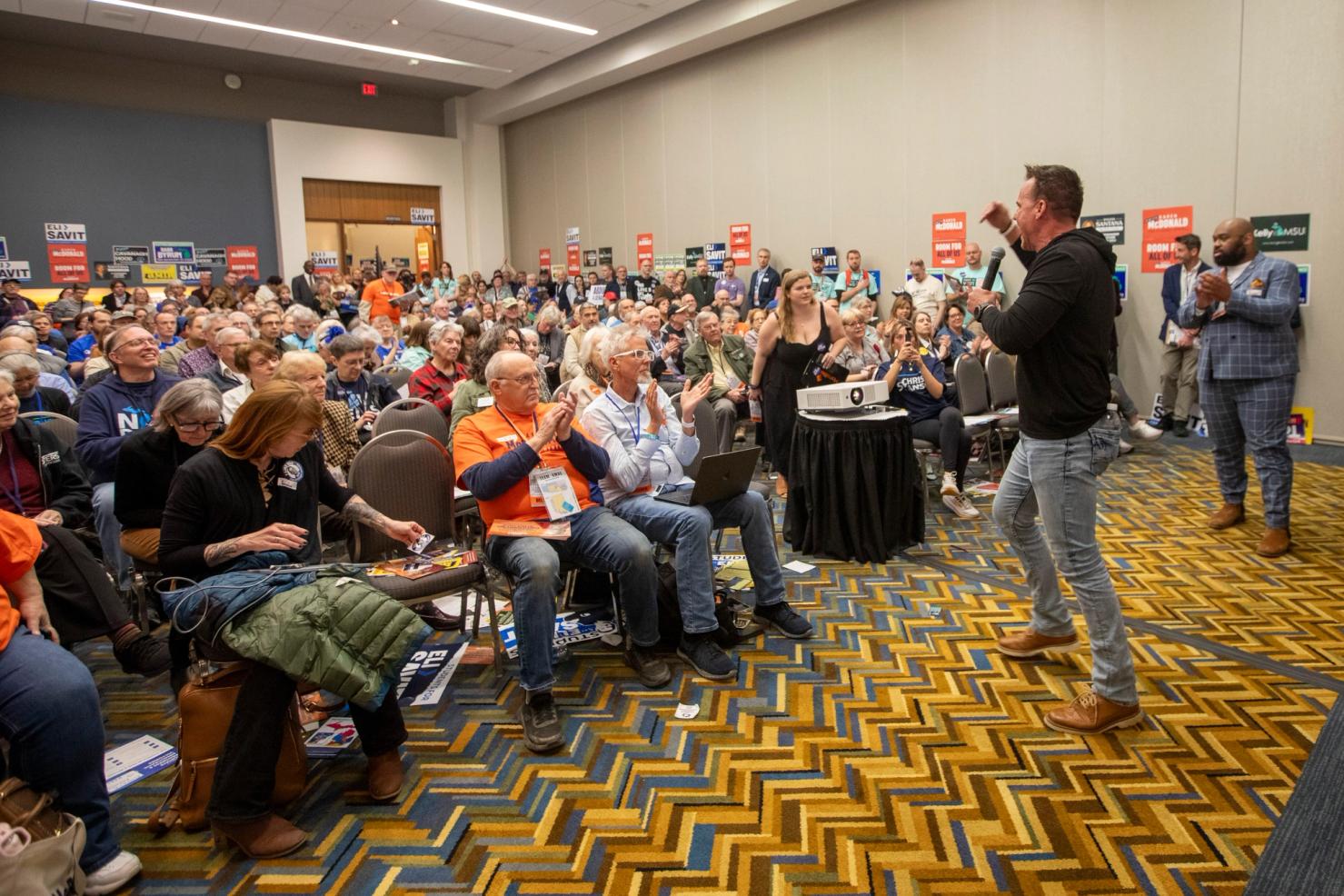 A Democratic candidate speaks to the crowd at Michigan’s state convention