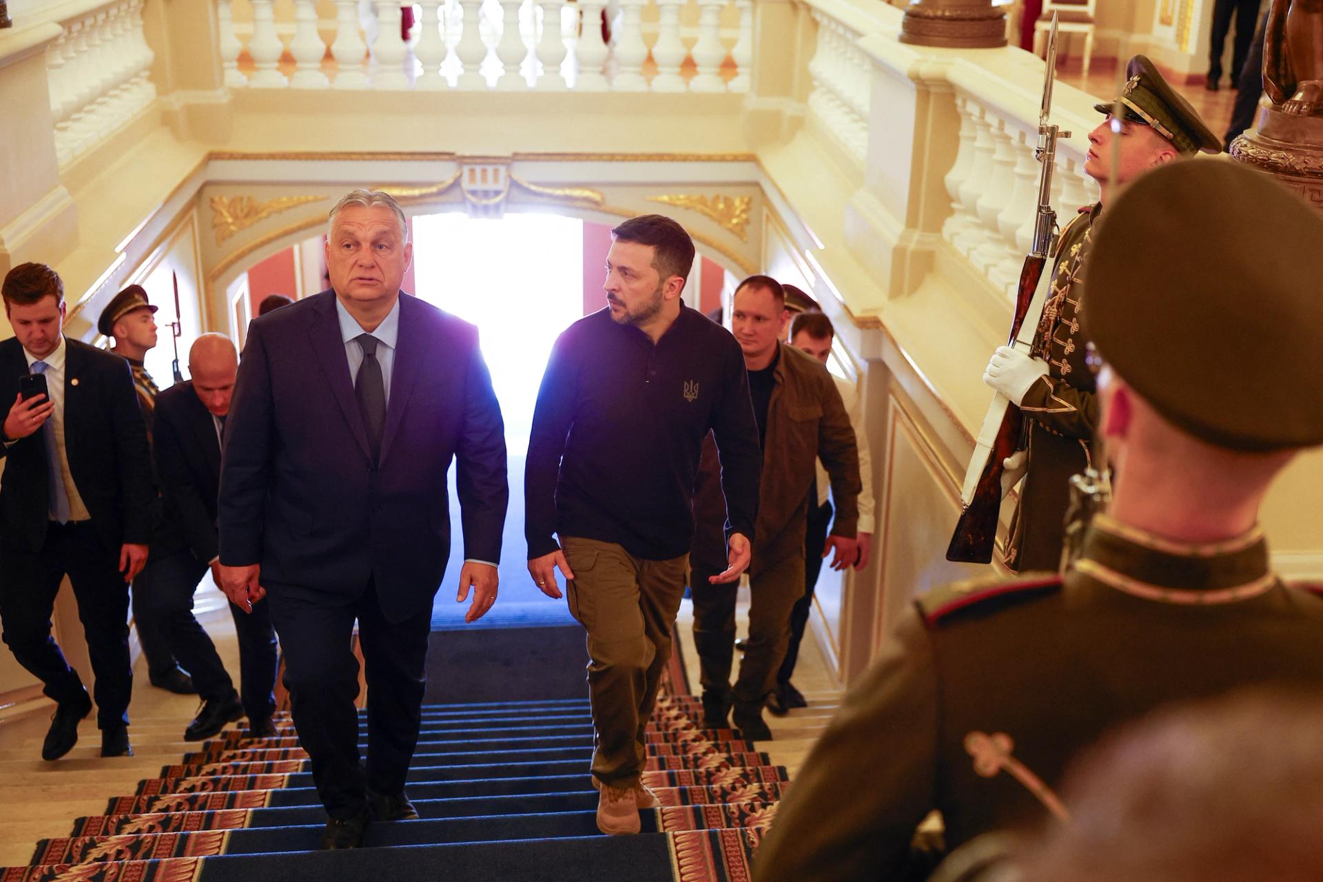 Hungary's Prime Minister Viktor Orban and Ukrainian President Volodymyr Zelenskiy arrive for a meeting, amid Russia's attack on Ukraine, in Kyiv, Ukraine July 2, 2024. REUTERS/Valentyn Ogirenko