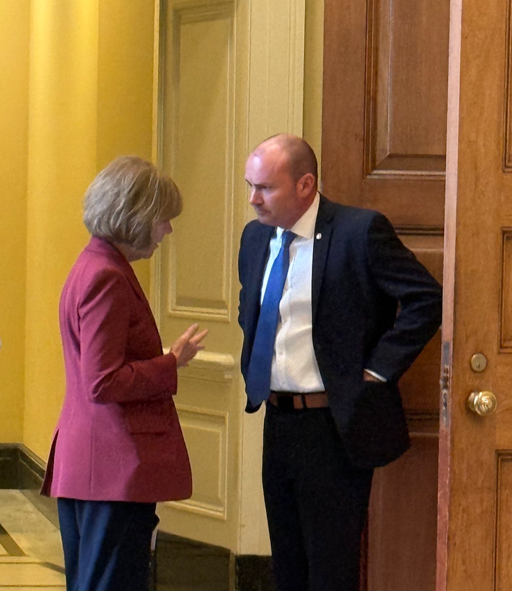 Sen. Tina Smith, D-Minn., pulls aside Sen. Mike Lee, R-Utah