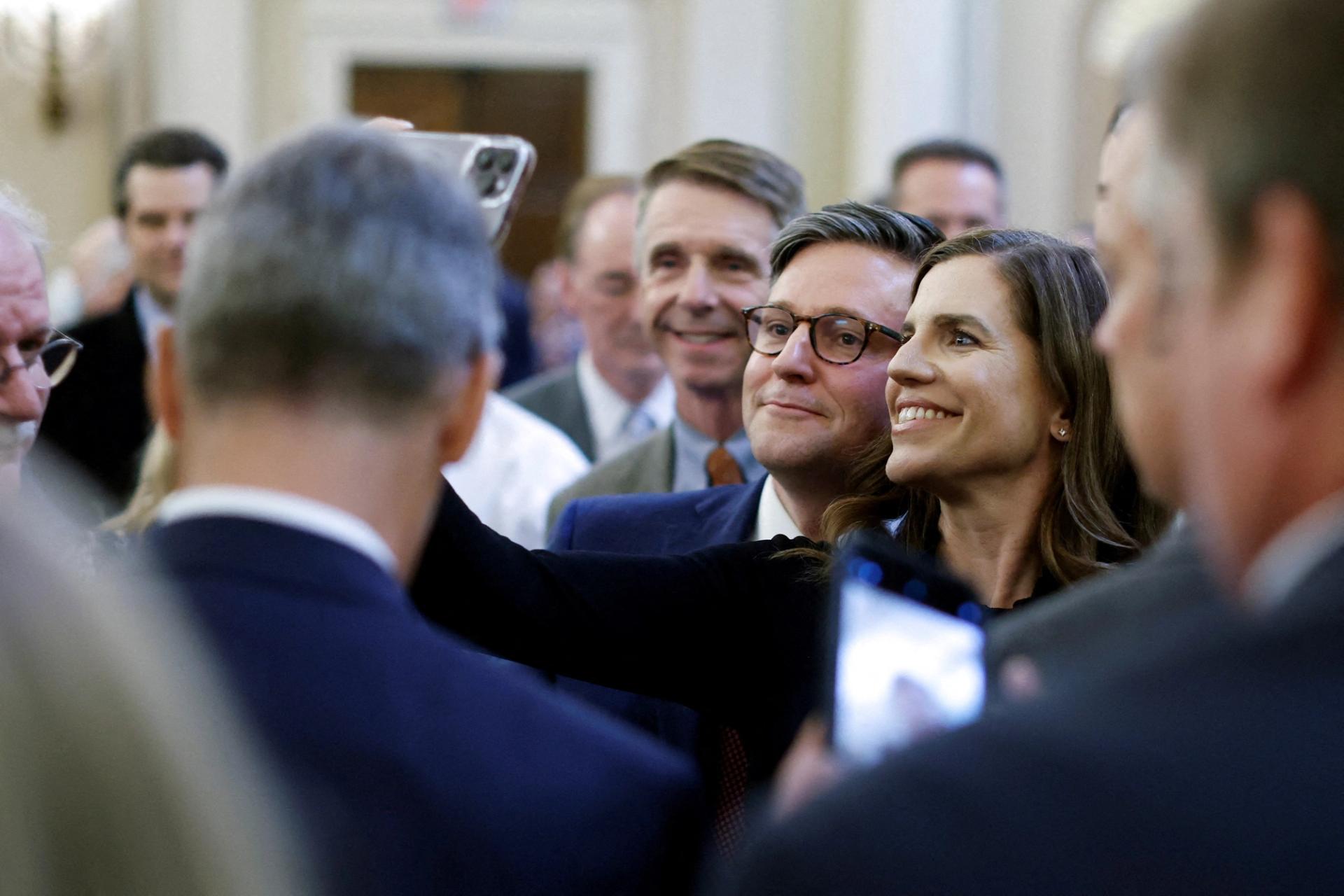 House Speaker Mike Johnson takes a selfie with Rep. Nancy Mace, R-SC.