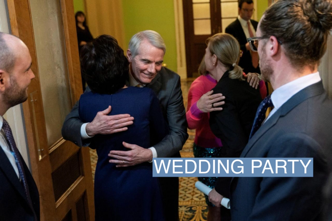 Senator Susan Collins (R-ME) hugs Senator Rob Portman (R-OH) as Senator Kyrsten Sinema (D-AZ) hugs Senator Tammy Baldwin (D-WI) following a news conference on the passage of the Respect for Marriage Act.
