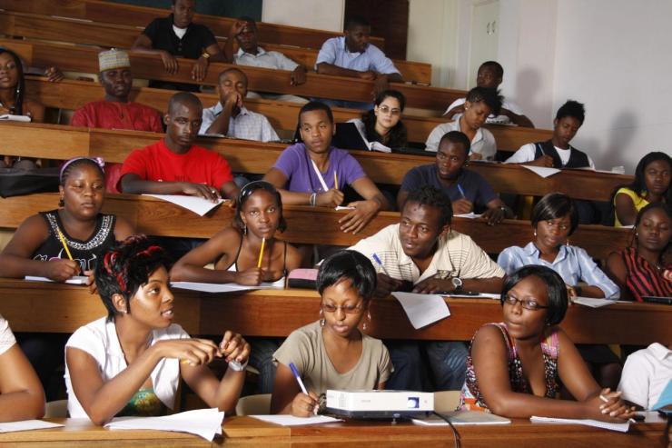 Students attend a lecture at Africa University in Zimbabwe.
