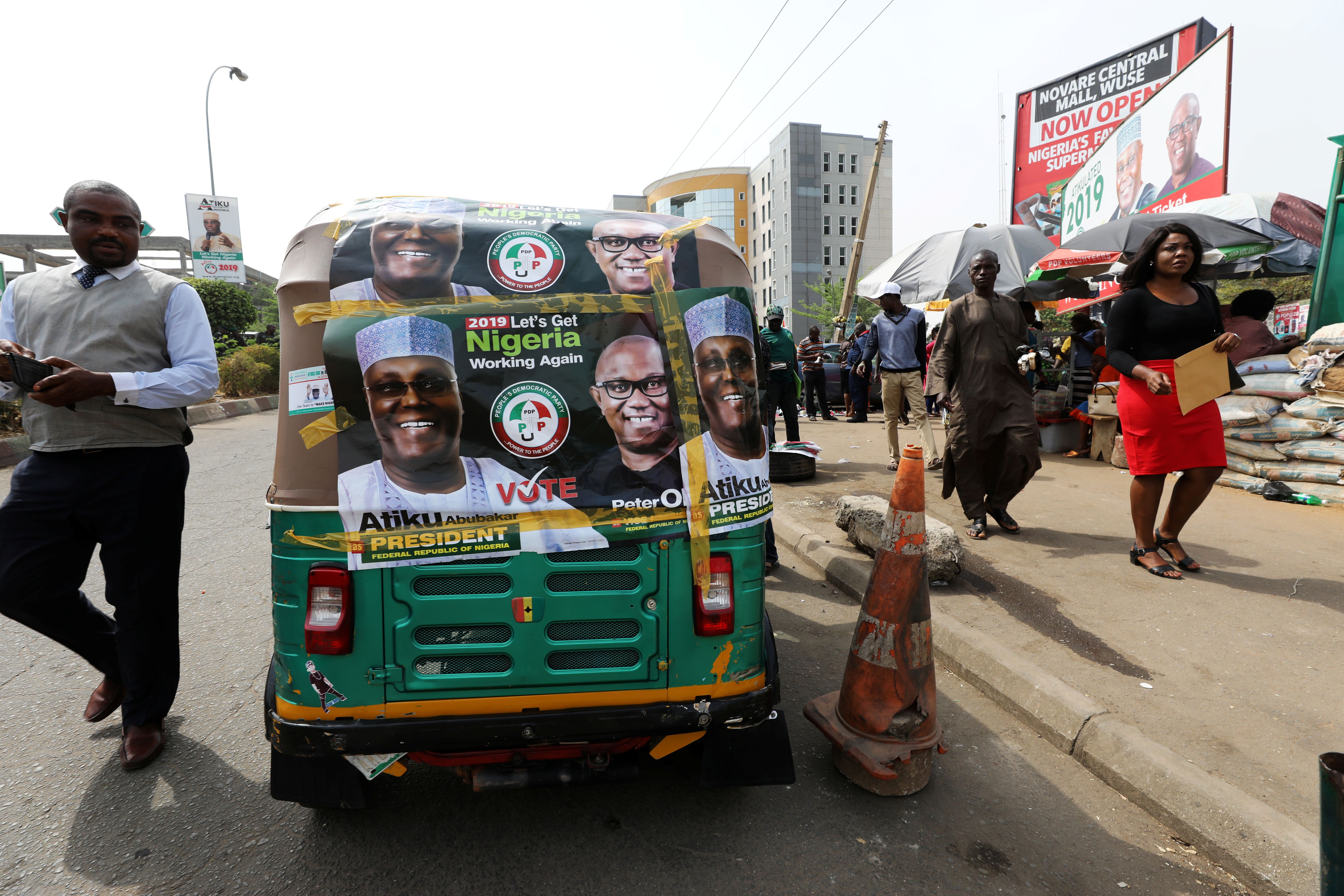 Campaign posters of People’s Democratic Party candidates Atiku Abubakar and Peter Obi in 2019.