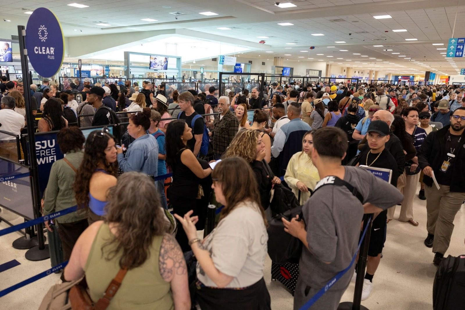 People waiting at TSA lines in the US. 