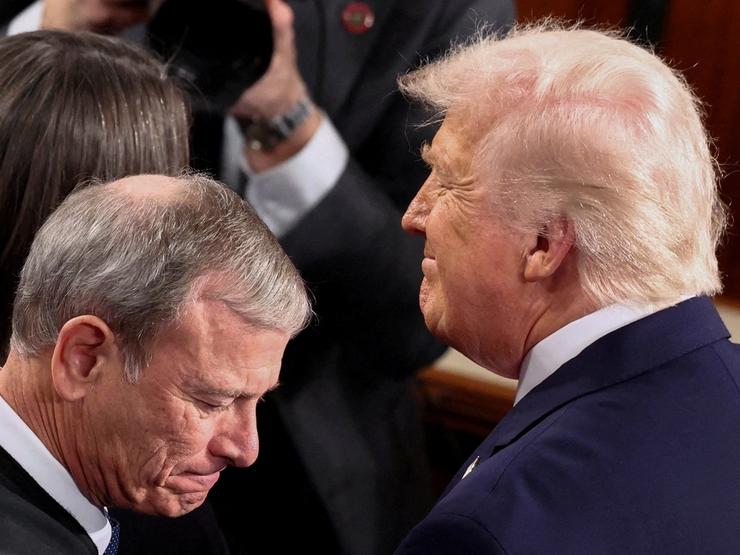 President Donald Trump, next to Supreme Court Chief Justice John
