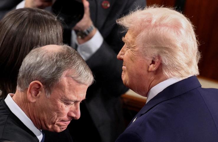 President Donald Trump, next to Supreme Court Chief Justice John