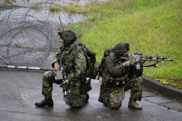 Japanese soldiers train during a joint military drill between Japan Self-Defense Forces, French Army and U.S. Marines, at the Kirishima exercise area in Ebino, Miyazaki prefecture, Japan
