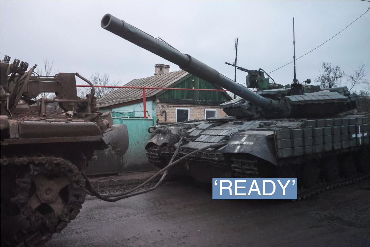 A tank is towed through a road, amid Russia’s invasion of Ukraine, near the bombed-out eastern Ukrainian city of Bakhmut, in the eastern Donetsk region, Ukraine, March 29, 2023. REUTERS/Violeta Santos Moura