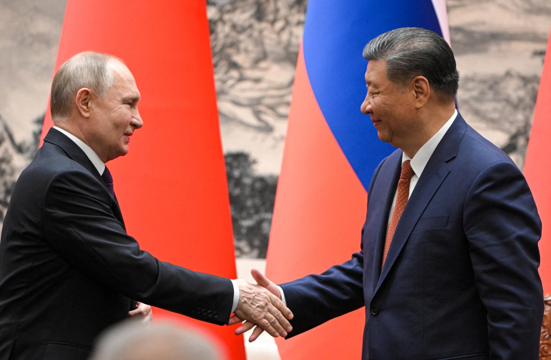 Russian President Vladimir Putin shakes hands with Chinese President Xi Jinping during a meeting in Beijing, China May 16, 2024. Sputnik/Sergei Guneev