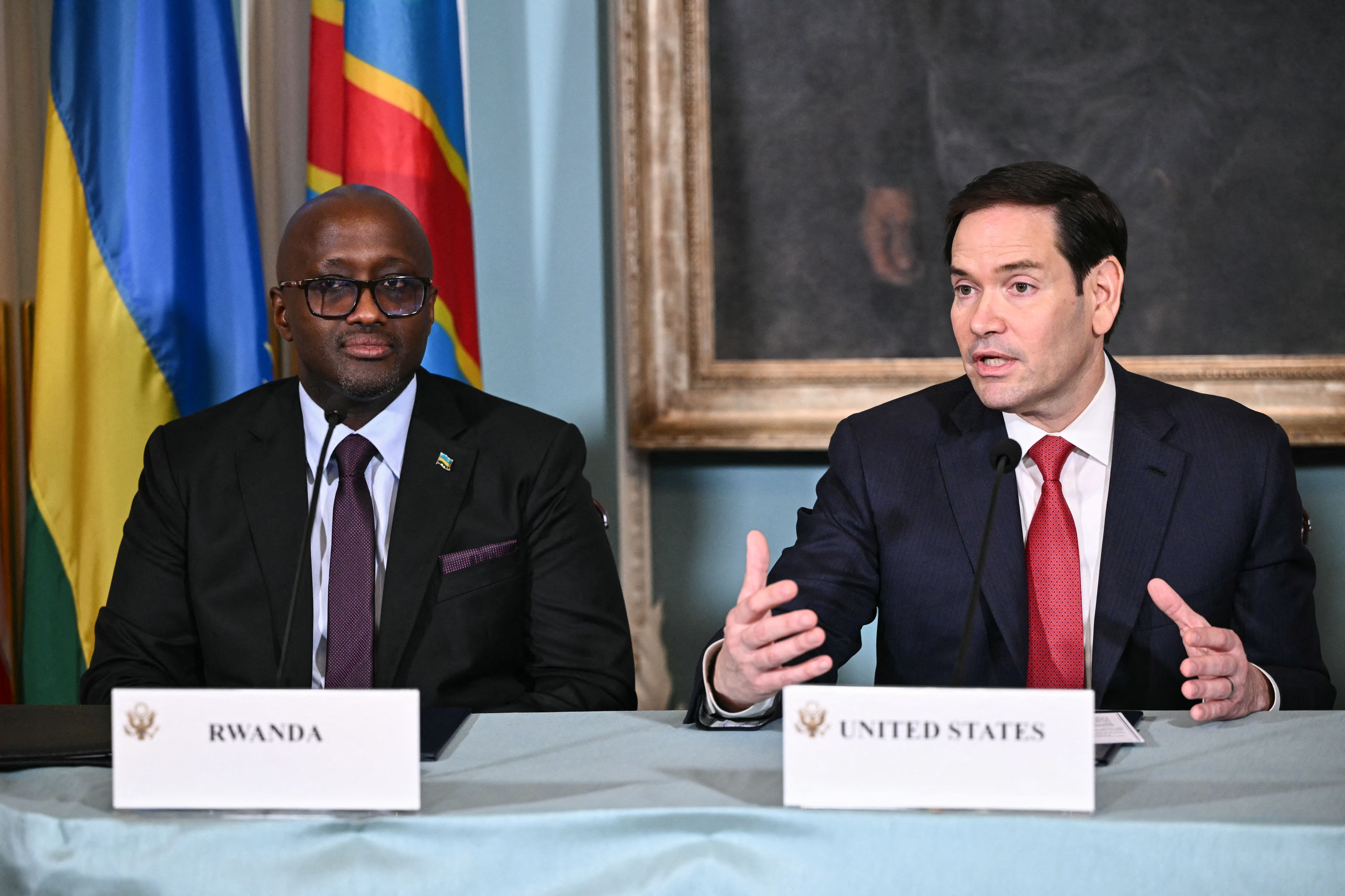 US Secretary of State Marco Rubio (R) speaks during a peace agreement signing between Rwanda and DR Congo as Rwandan Foreign Minister Olivier Nduhungirehe (L) looks on at the State Department in Washington, DC, on June 27, 2025. 