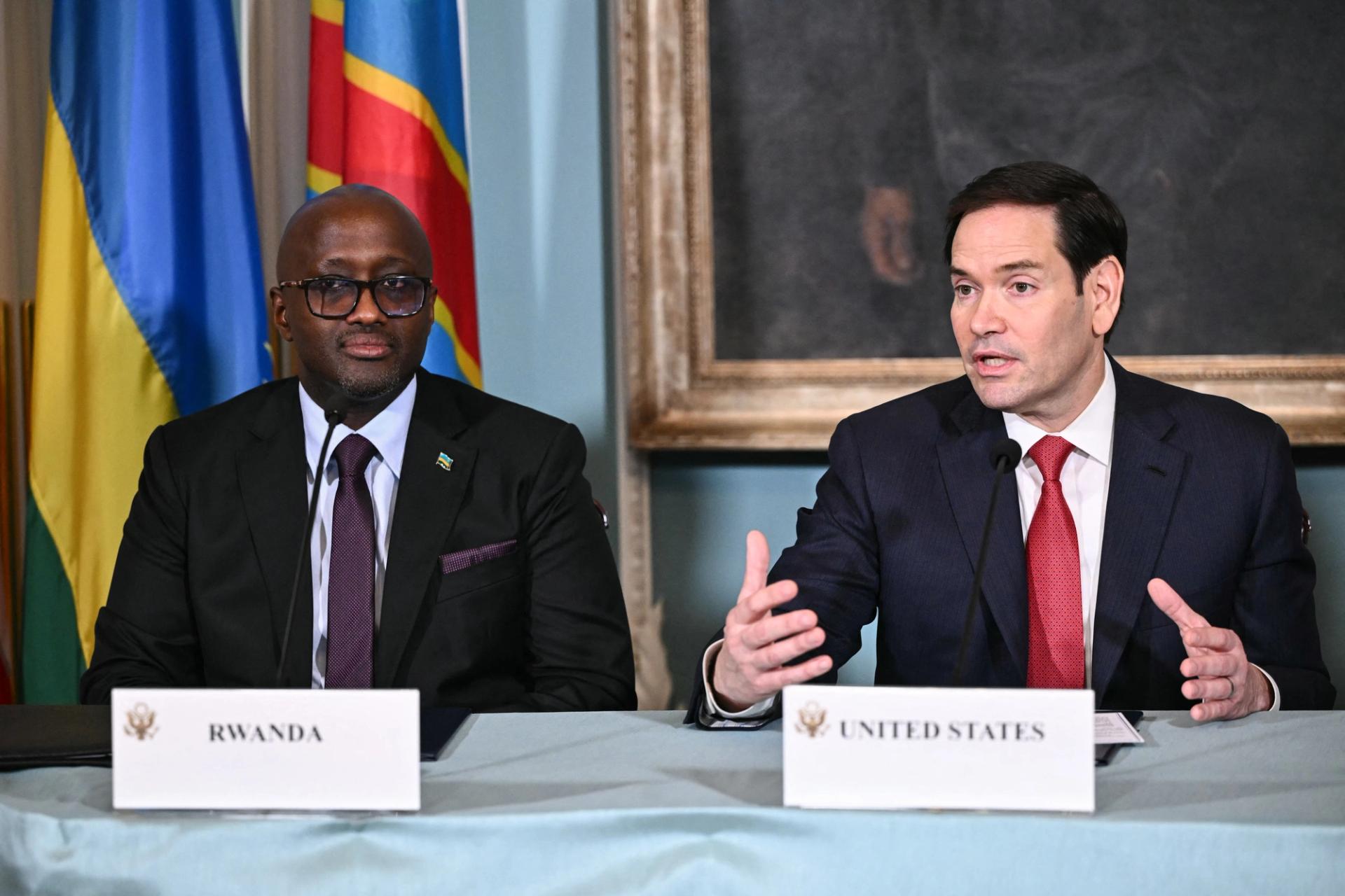 US Secretary of State Marco Rubio (R) speaks during a peace agreement signing between Rwanda and DR Congo as Rwandan Foreign Minister Olivier Nduhungirehe (L) looks on at the State Department in Washington, DC, on June 27, 2025. 