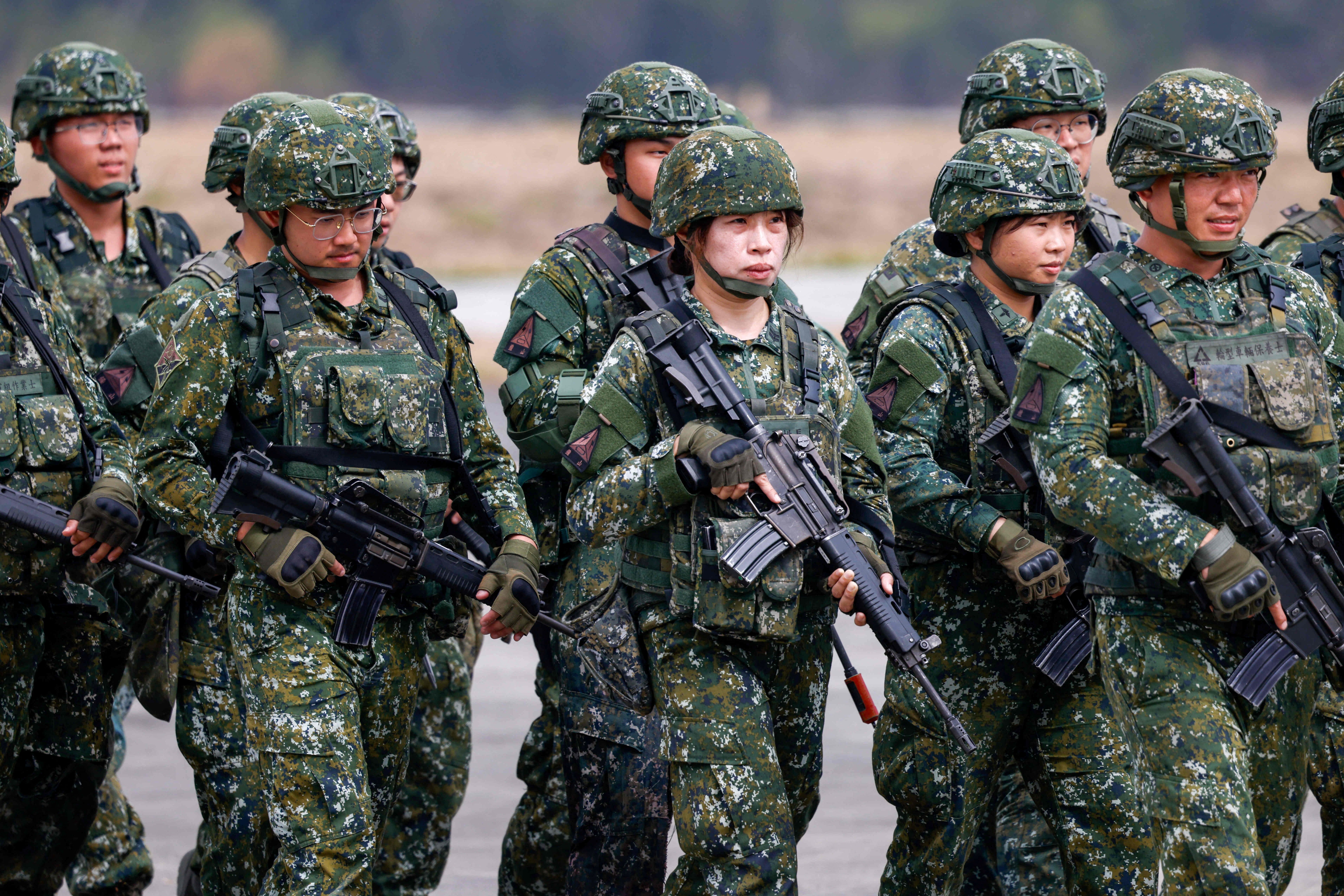Taiwan army soldiers display defensive preparedness during an annual military exercise.