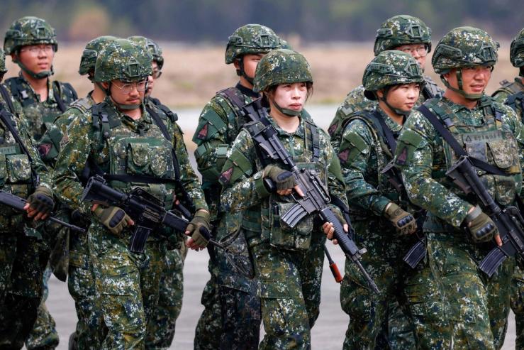 Taiwan army soldiers display defensive preparedness during an annual military exercise.