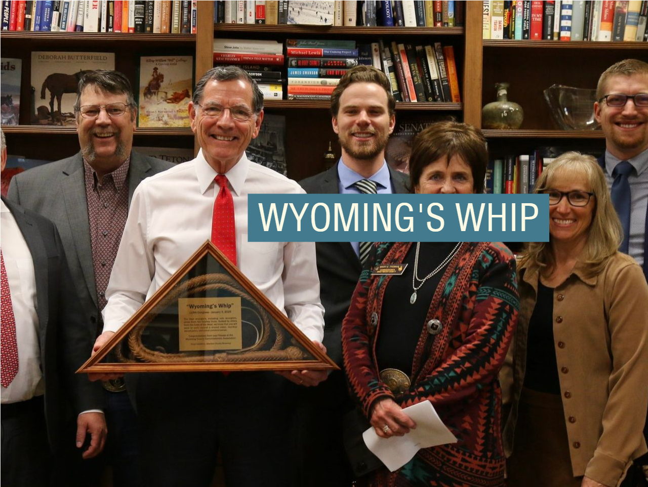 Sen. John Barrasso holds a whip he received from constituents 
