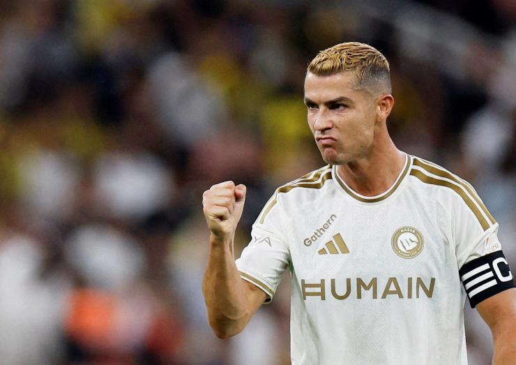 Al Nassr’s Cristiano Ronaldo celebrates after Angelo Gabriel scores their first goal.