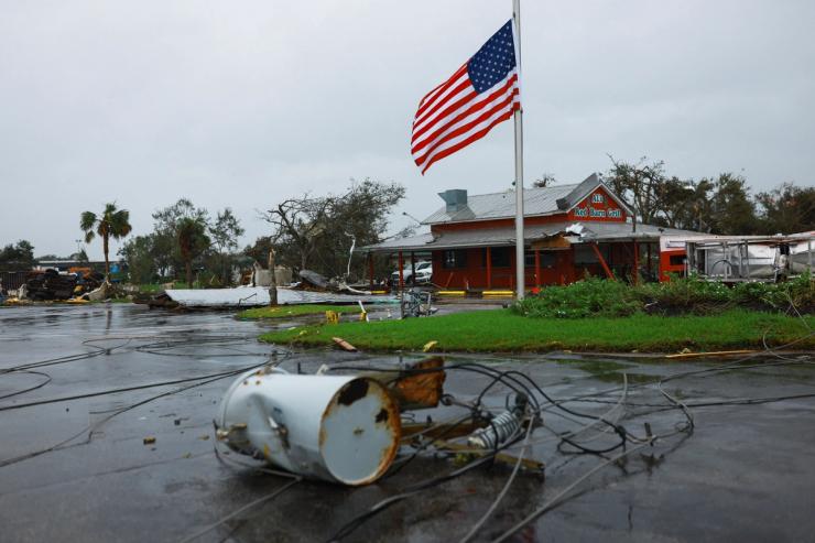A view of a damaged building of Al’s Family Farms, a business which Jeff Schorner lost following Hurricane Milton landfall,