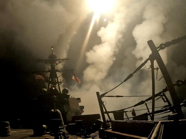 A ship fires missiles at an undisclosed location, after U.S. President Donald Trump launched military strikes against Yemen’s Iran-aligned Houthis.