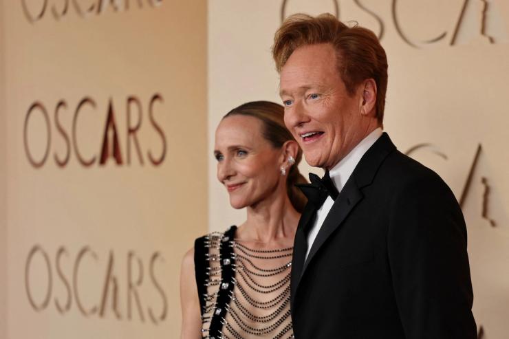Oscars host Conan O’Brien poses with Liza Powel O’Brien.