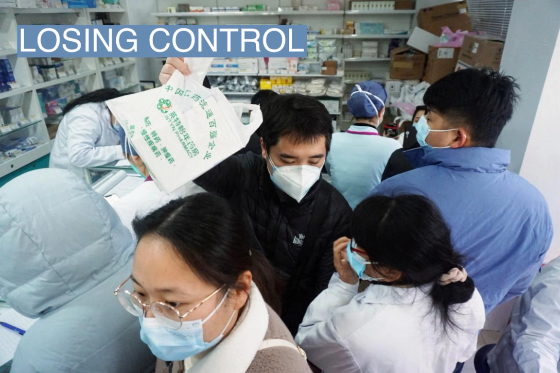 People queue for antigen test kits in Hangzhou.