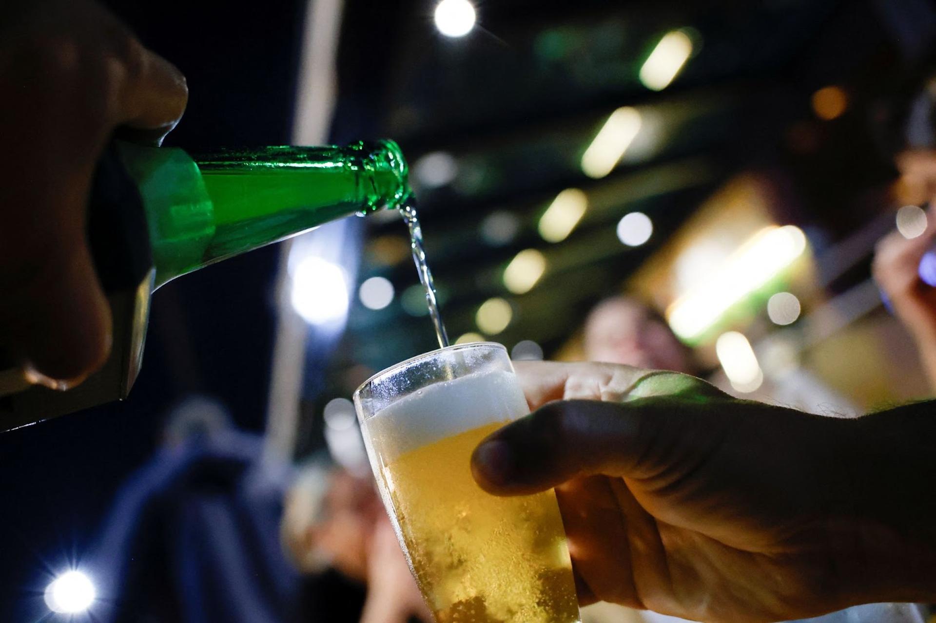 Beer being poured into glass.