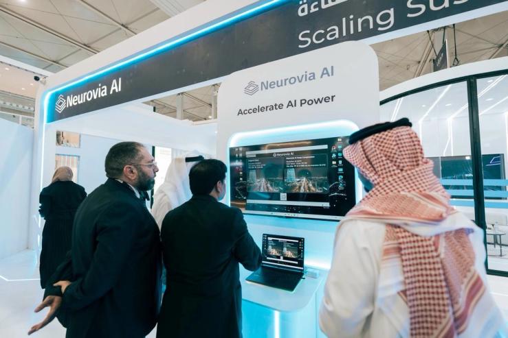 Photo of a demonstration of compressed footage at Neurovia AI’s booth at LEAP in Riyadh.