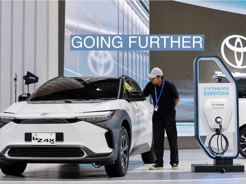 A worker cleans Toyota's Electric Vehicle bZ4X, that is displayed during the Gaikindo Indonesia International Auto Show in Tangerang, near Jakarta, Indonesia, August 10, 2023. REUTERS/Willy Kurniawan