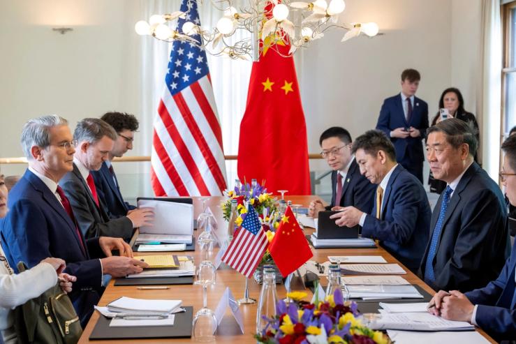 China and US officials prepare to discuss on the day of a bilateral meeting between the U.S. and China, in Geneva