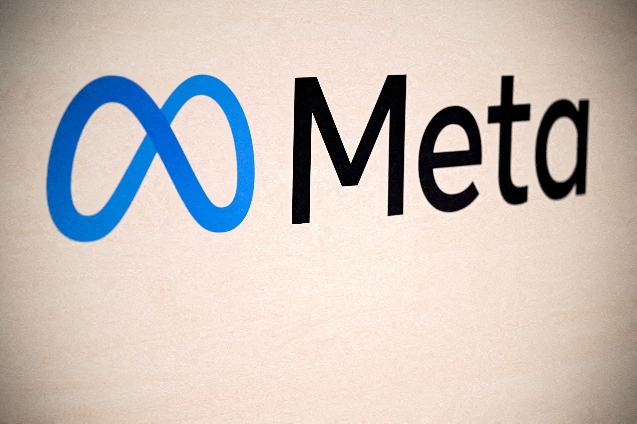 A Meta logo.