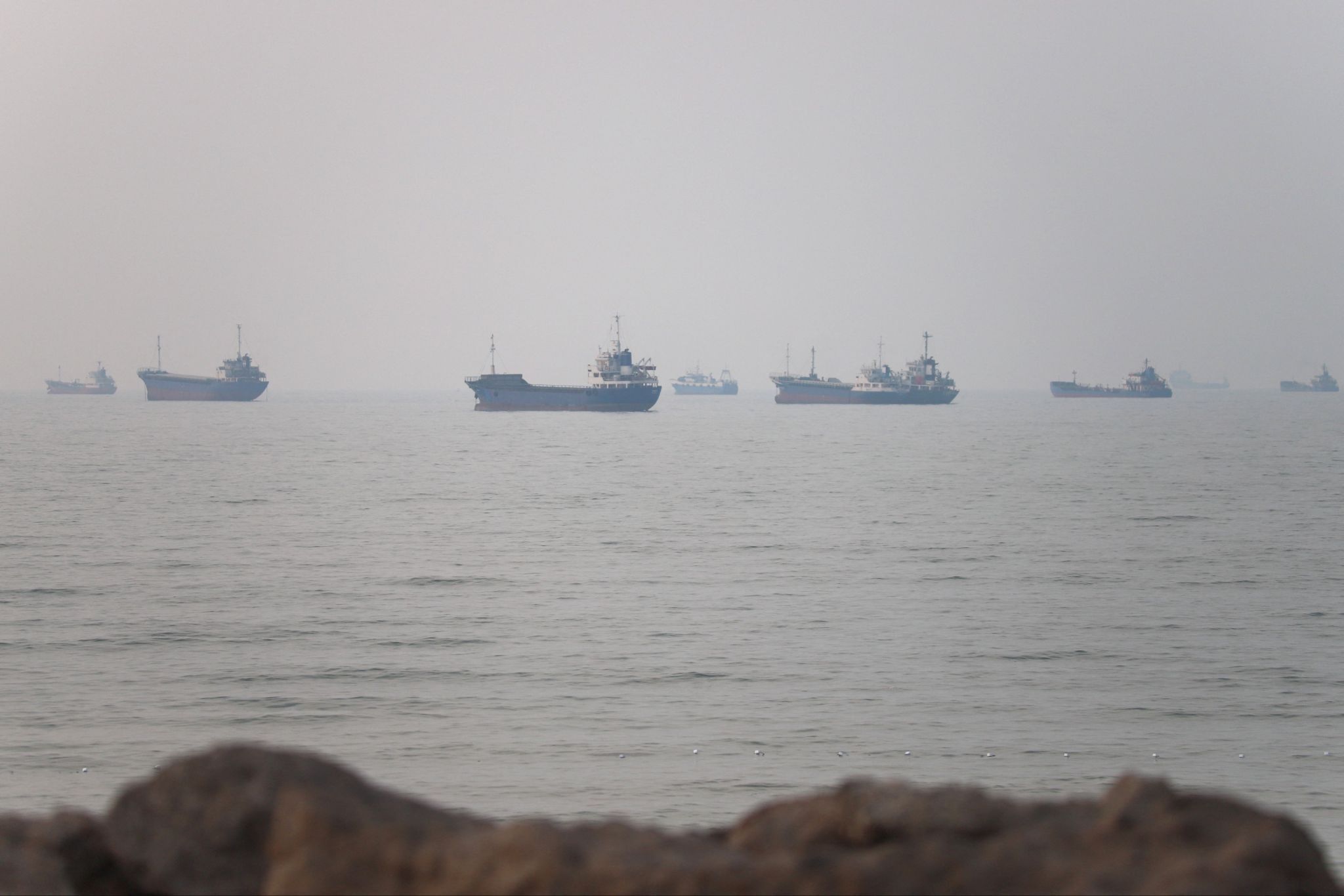 Vessels in the Strait of Hormuz near the beach of Bandar Abbas, Iran.