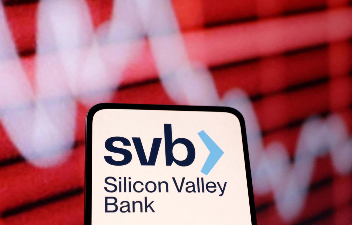 SVB (Silicon Valley Bank) logo and decreasing stock graph are seen in this illustration taken March 10, 2023. REUTERS/Dado Ruvic/Illustration/File Photo