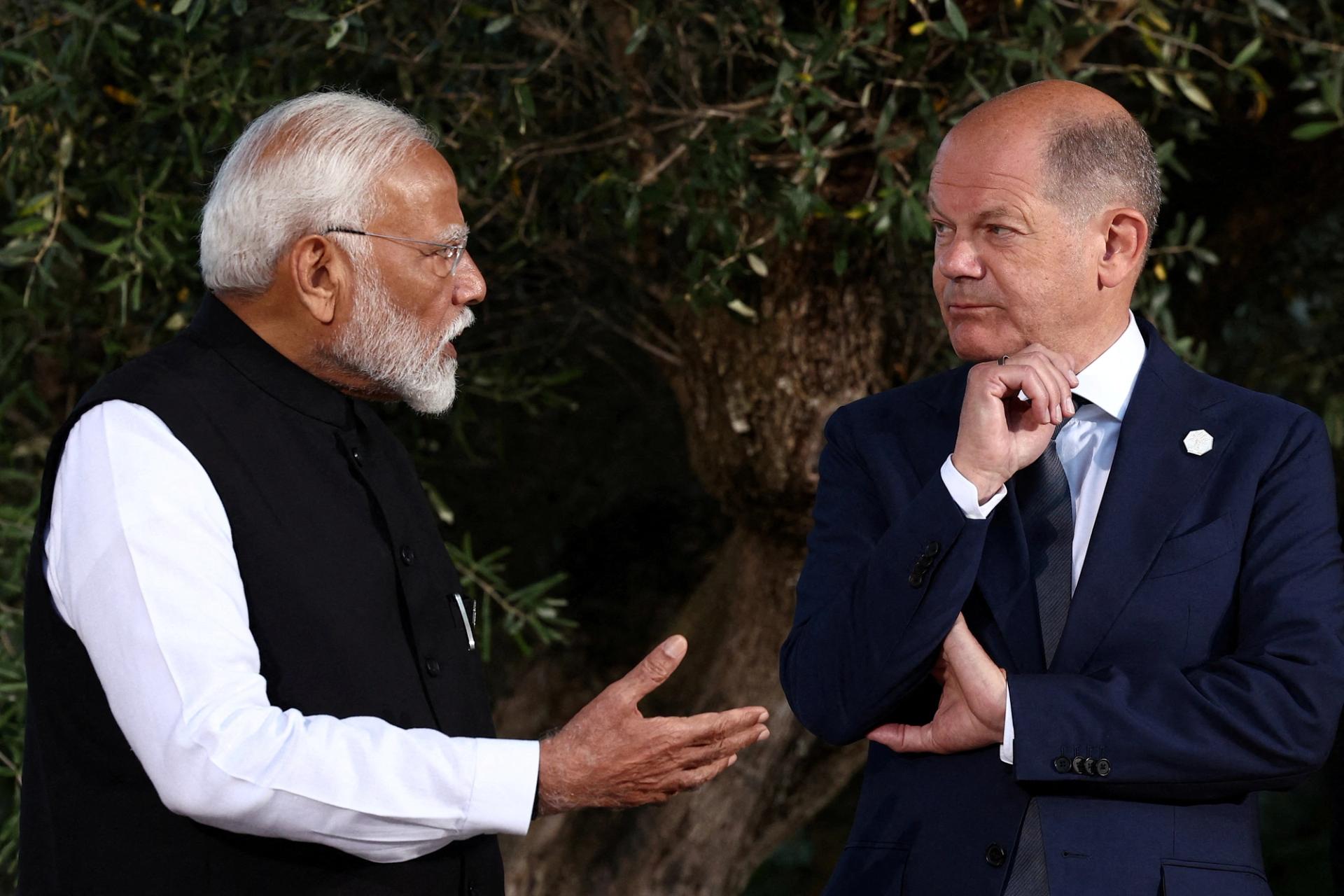 Indian Prime Minister Narendra Modi speaks with German Chancellor Olaf Scholz at the G7 summit in Switzerland in June.