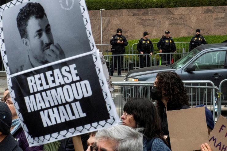 DHS police officers stand guard as protesters take part in a rally organized by Jewish activists against the detention by ICE agents of Palestinian activist and Columbia University graduate student Mahmoud Khalil in New York City.