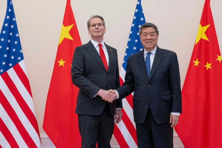 U.S. Treasury Secretary Scott Bessent and Chinese Vice Premier He Lifeng shake hands during trade talks at OECD (Organisation for Economic Co-operation and Development) headquarters in Paris, France.