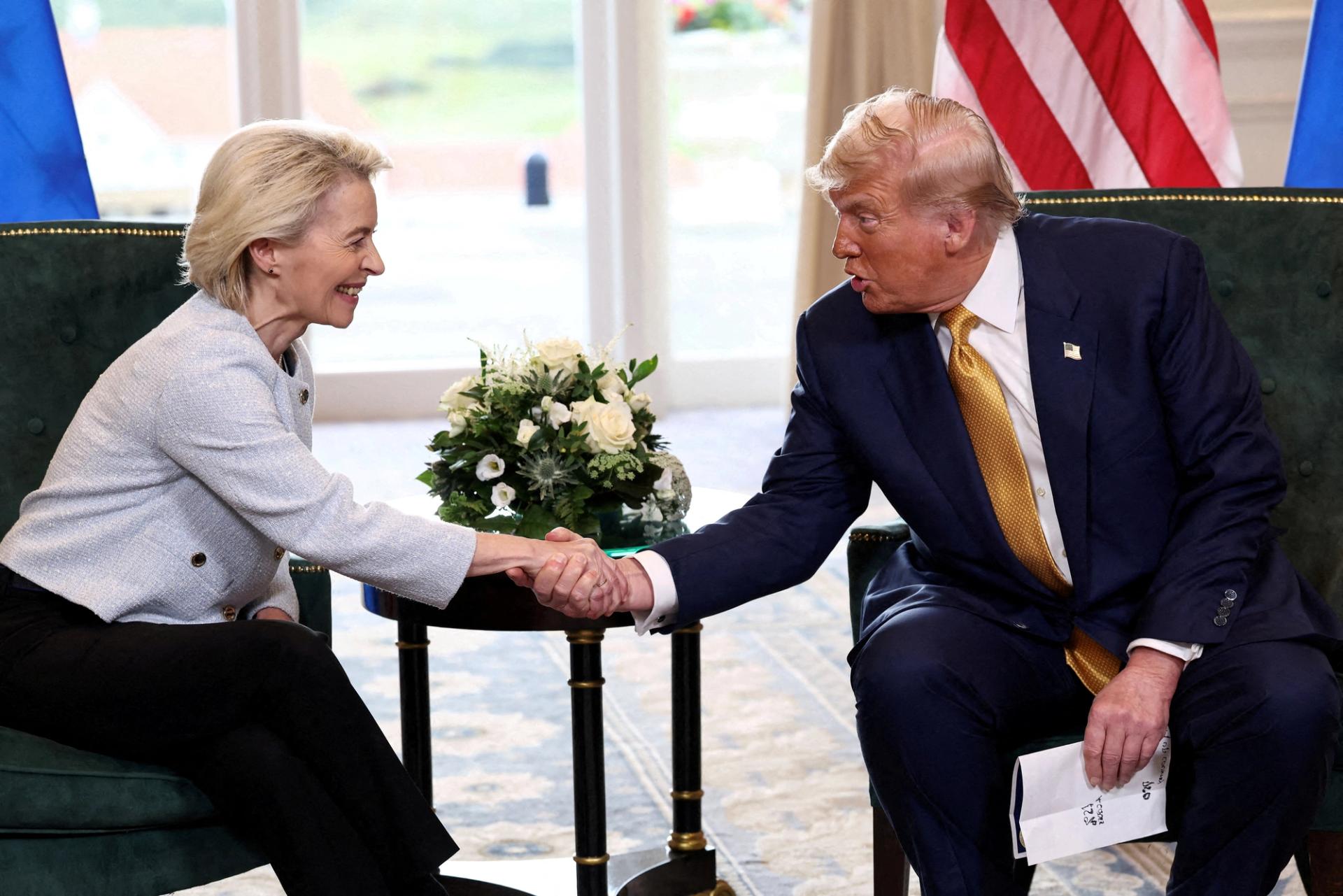  European Commission President Ursula von der Leyen sits with U.S. President Donald Trump